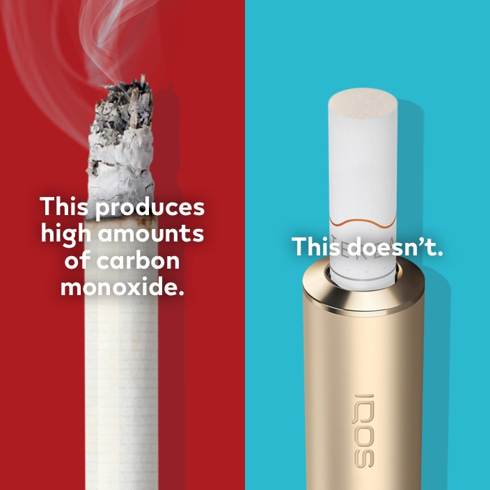 Lit cigarette end compared to IQOS stick in IQOS holder. Lit cigarette end compared to IQOS stick in IQOS holder.