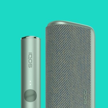 جهاز IQOS ILUMA باللون الأخضر الزمرّدي.
