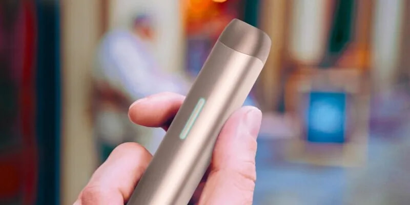 a man holding a lil solid ez.