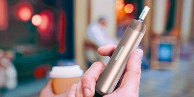 a man holding a lil solid ez.